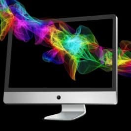 Colourful patterns flying through a black computer screen