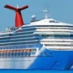Large ferry on a deep blue sea with blue sky behind