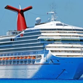 Large ferry on a deep blue sea with blue sky behind